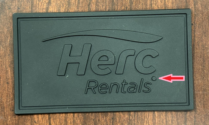 Herc Rentals Competitor With A Solid Blob instead of Registration Mark on 5000 caps Citing Small Size As A problem For compromised Detail